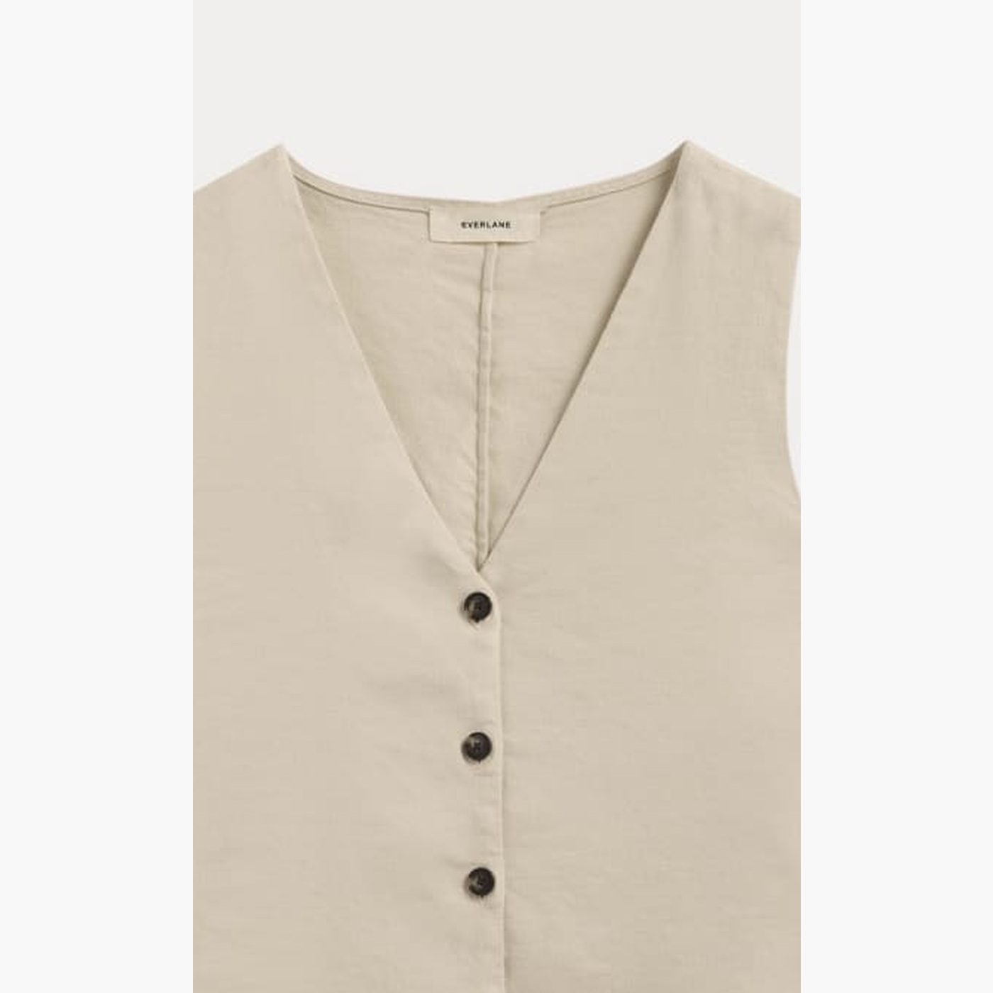 linen waistcoat button and fabric detail