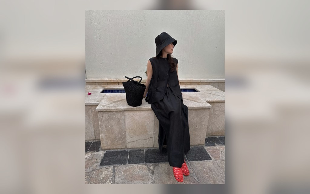 caged jelly sandals styled with linen pants