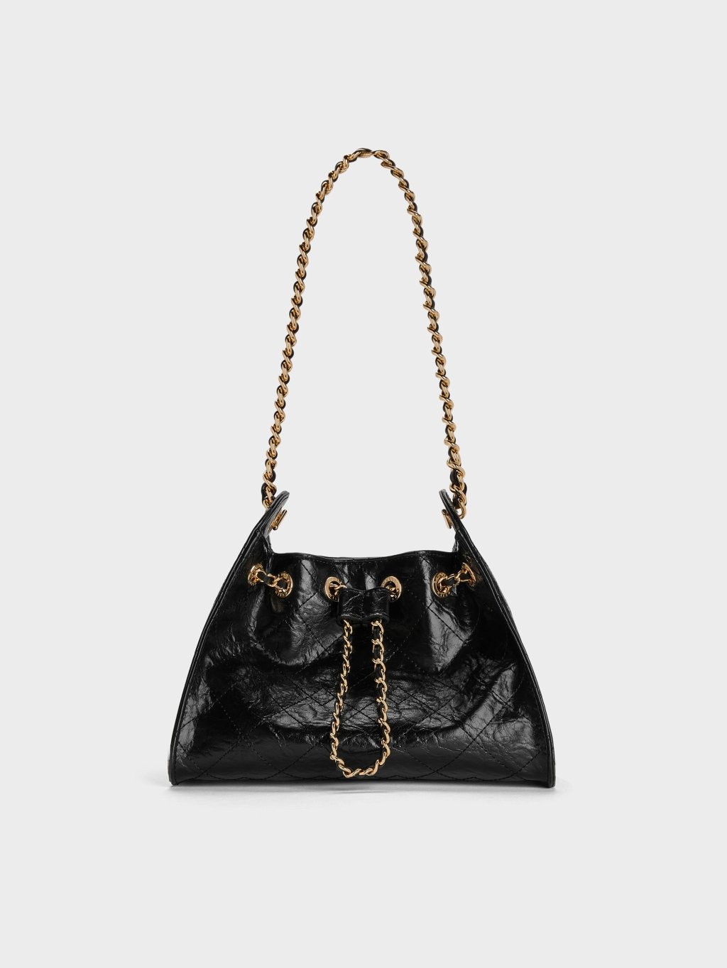 Why a Pouch Bag Makes Spring Clothes Look More Refined