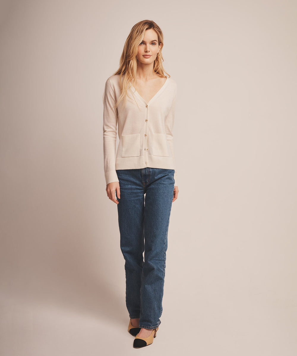 thin cardigan over the shoulders makes a plain tank look intentional 3