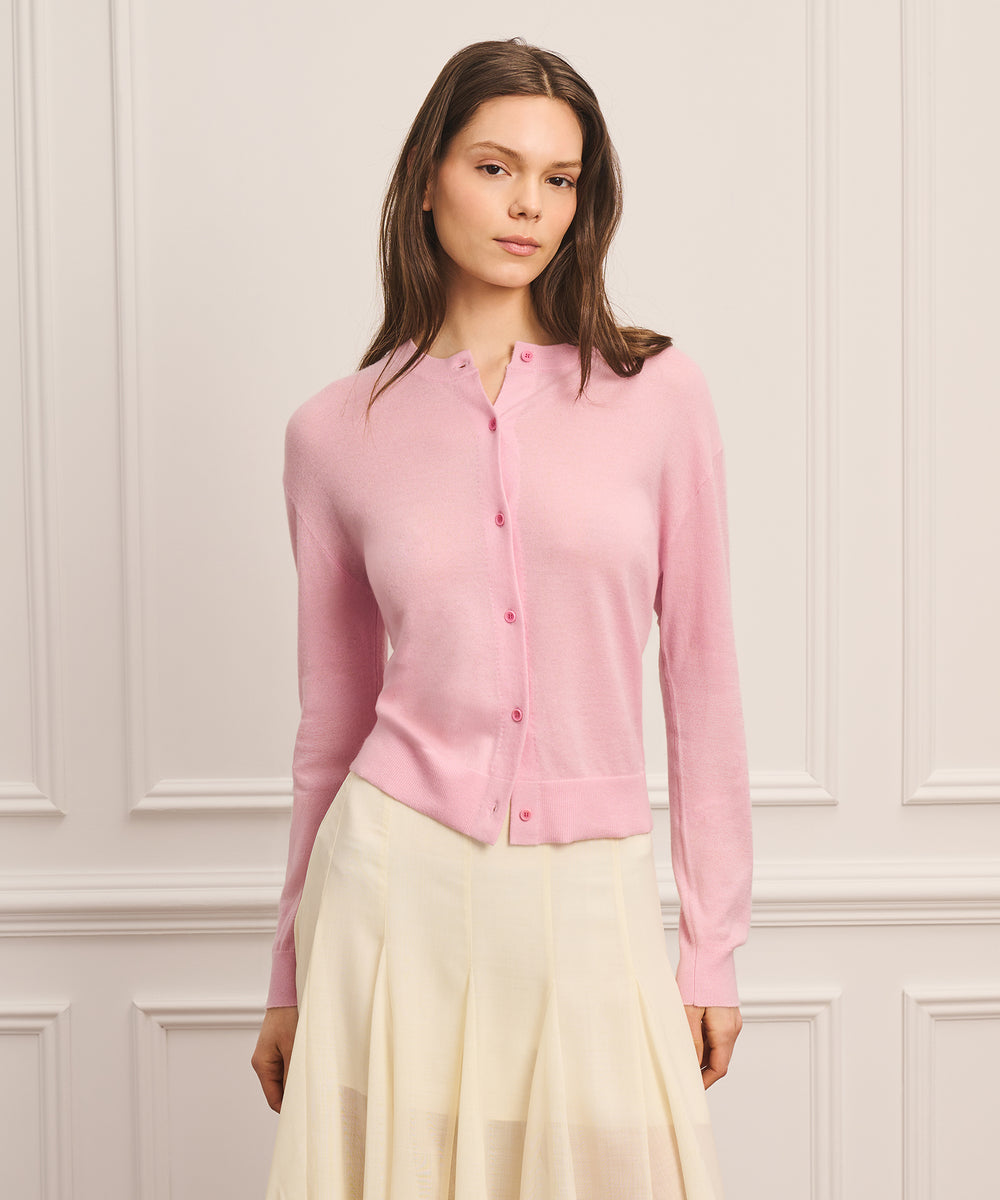 thin cardigan over the shoulders makes a plain tank look intentional 4