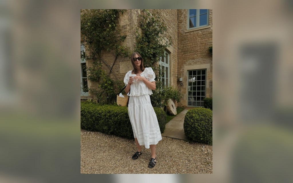 white summer dress styled with black fisherman sandals